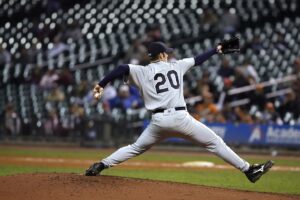 pitcher with long stride after pitching instruction