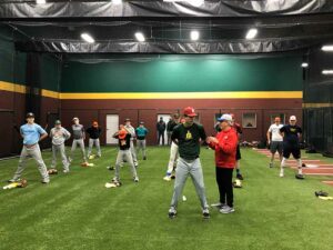 Tom House talking to pitcher about S.T.A.T. testing for pitching velocity capacity