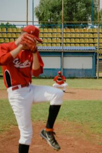 pitcher throwing from the mound during pitching lessons