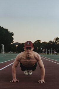 Baseball pitcher doing push ups after learning about functional strength in pitching lessons