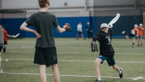 Youth pitcher performing towel drill for pitching velocity and mechanics improvement