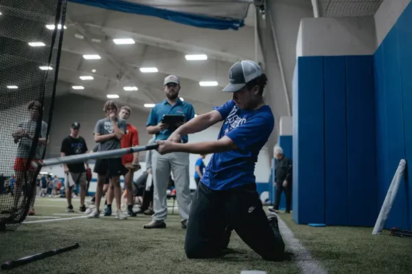 Pitcher working with a National Pitching Pro speed velocity bat, Youth Pitcher increasing velocity with help from National Pitching