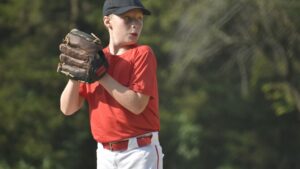 Young pitcher in ideal set position after youth pitching instruction